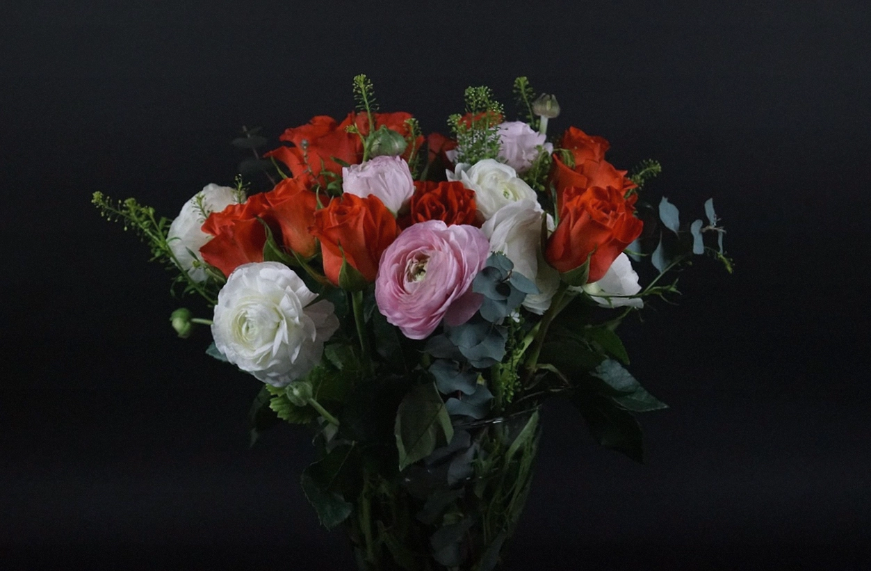 Seasonal market flowers in buckets at the Auckland flower market